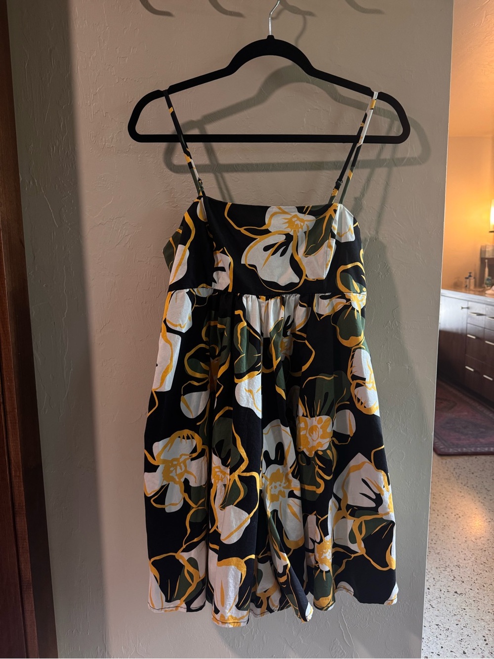 Hutch Anthropologie  Black Floral romper with Yellow & White Blooms